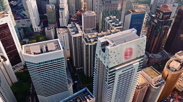 Aerial view of the city of Kuala Lumpur in the capital of Malaysia, high-rise buildings. Photo of skyscrapers in a big city. High quality photo
