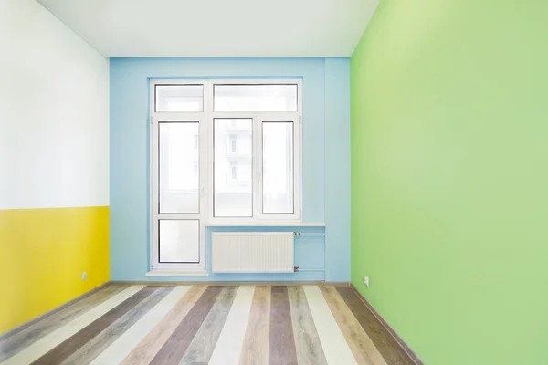 Empty cheerful kids room with color walls