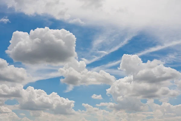 Background with White clouds before a rain cloud Stock Image