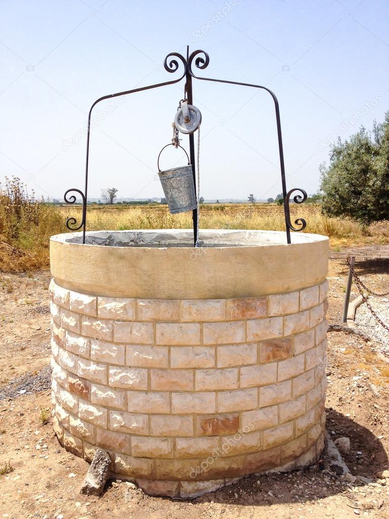 Old Water Well With Pulley and Bucket