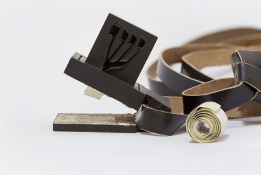 Tefillin manufacturing process. Leather clipart