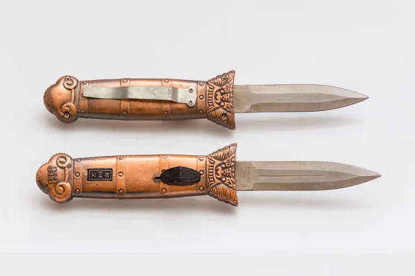 Un coltello a lama commutata, in rame — Foto Stock