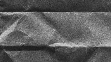 Buruşmuş kağıt dokusu siyah arkaplan. Beyaz kırışık çarşaf. Kaplama efekti