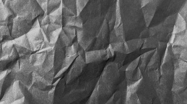 Buruşmuş kağıt dokusu siyah arkaplan. Beyaz kırışık çarşaf. Kaplama efekti