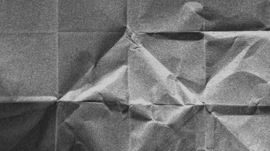 Buruşmuş kağıt dokusu siyah arkaplan. Beyaz kırışık çarşaf. Kaplama efekti