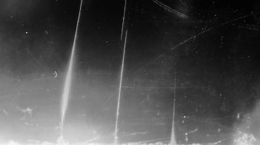 Tozlu çizikler taranmış eski film dokusu. Hasarlı tahıl. Üst üste efekt arkaplanı