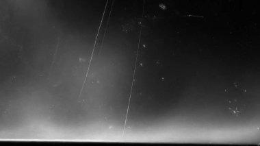 Tozlu çizikler taranmış eski film dokusu. Hasarlı tahıl. Üst üste efekt arkaplanı