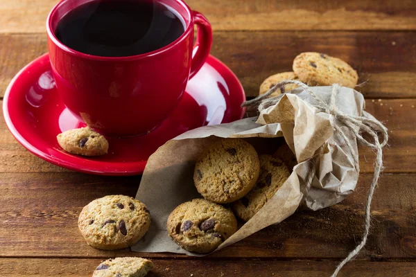 Xícara de biscoitos de café e aveia. contexto . — Fotografia de Stock