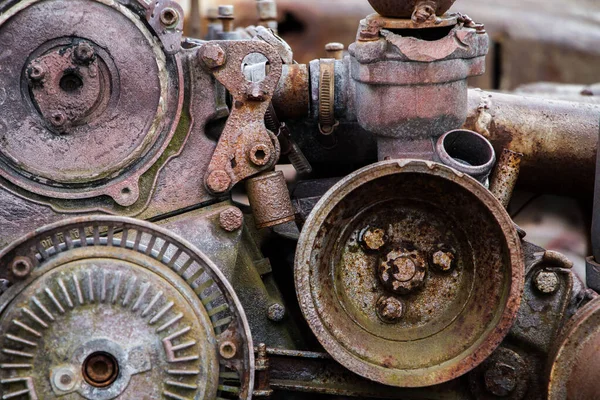 steampunk texture, background, abstract stylized collage of a mechanical device, rust and traces of erosion are visible, close-up