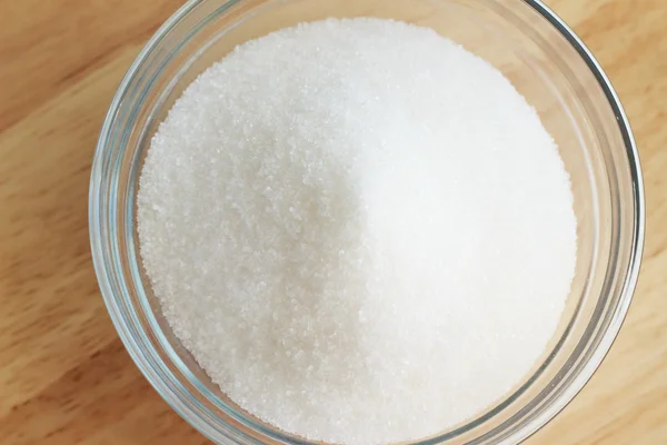 Sugar in glass bowl — Stock Photo, Image