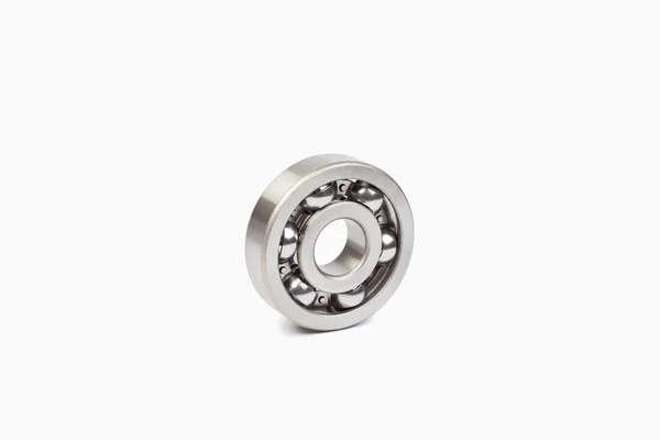 Close-up bearings spare part of mechanical on the white background. — Stock Photo, Image