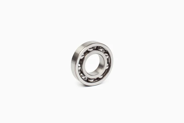Close-up bearings spare part of mechanical on the white background. — Stockfoto