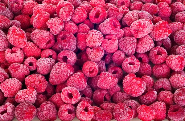Delicious frozen raspberries background - detail — Stock Photo, Image