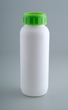 White plastic bottle mockup with green cap