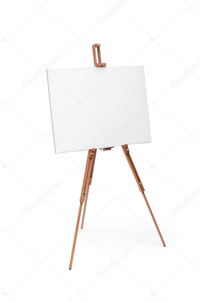 White painter canvas on wooden easel isolated on white with clip