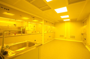 Cleanroom in nuclear research centre, photolithography clipart
