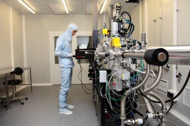 Cleanroom in nuclear research centre, molecular beam epitaxy clipart