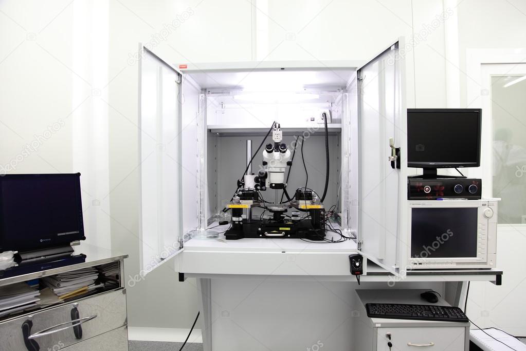 Cleanroom in nuclear research centre, microscope