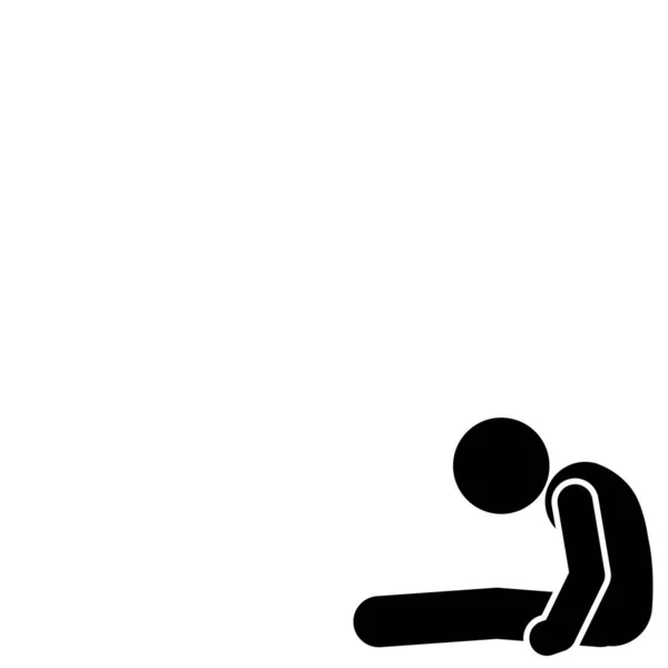 Üzgün adam, eğik başıyla oturuyor.