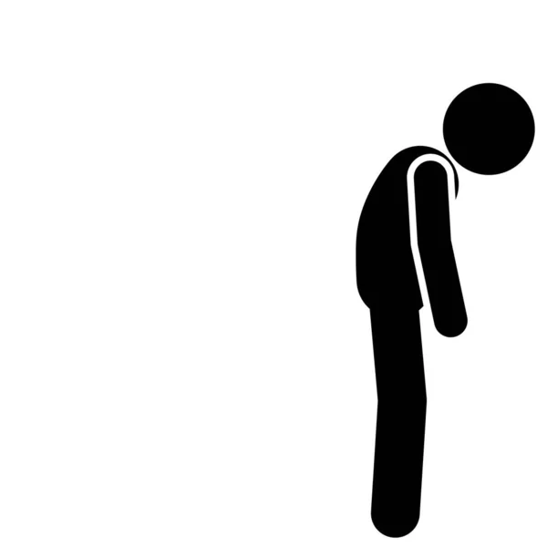 Duvara yaslanmış yas tutan kişi