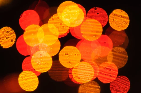 Sfondo colorato con luci bokeh sfocate . — Foto Stock