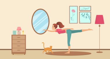 Sabahları evde yoga yapan genç bir kadın spor yapıyor, vücudunu esneten aktif bir kız.