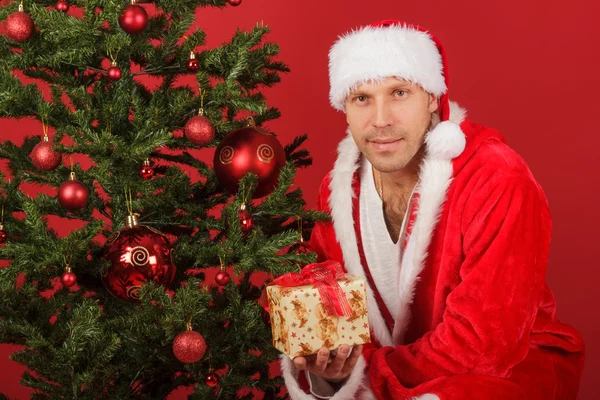 Christmas man with santa hat — Stock Photo, Image