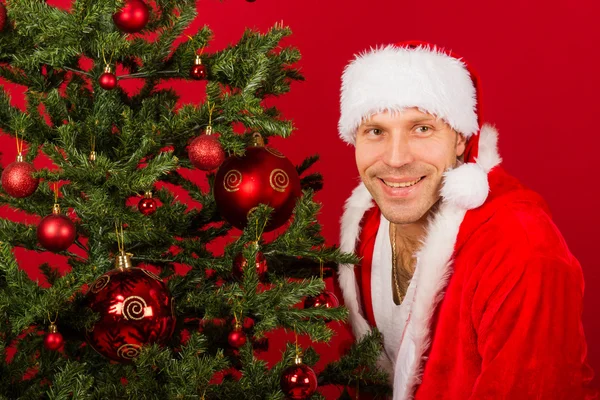 Christmas man with santa hat — Stock Photo, Image