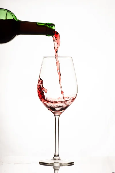 Verre de vin rouge et bouteille — Photo