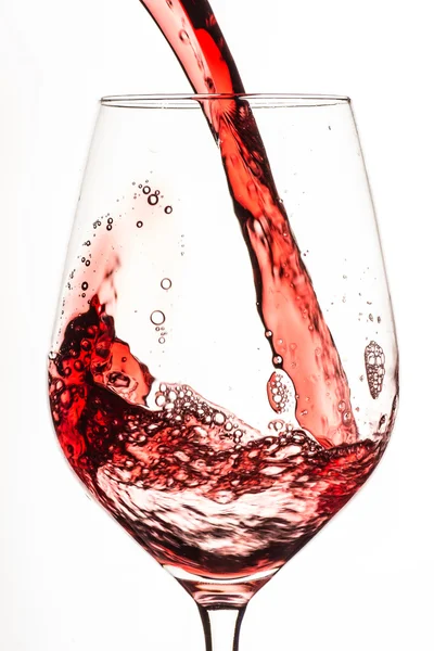 Verre et vin rouge spash — Photo