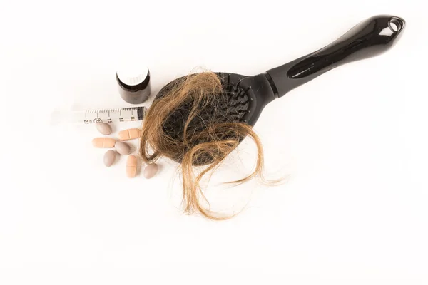 Léčba vypadávání vlasů na bílém pozadí — Stock fotografie
