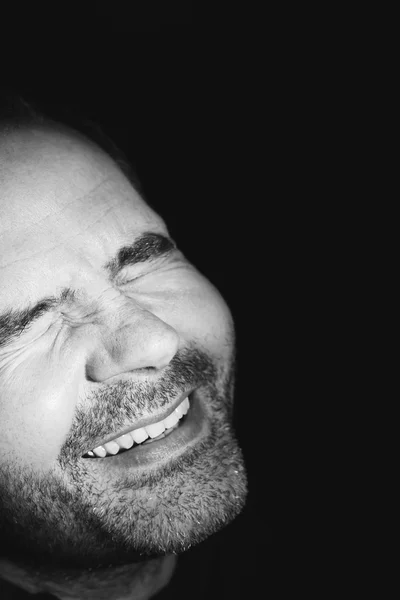Close-up de homem de negócios sorrindo para o brilho — Fotografia de Stock