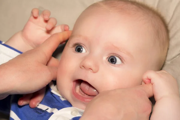 Portrait of  beaiutiful four months old baby Stock Picture