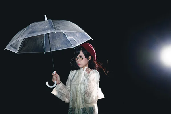 Asian girl with umbrella — Stock Photo, Image