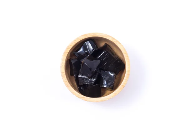 Grass jelly in wooden bowl — Stock Photo, Image