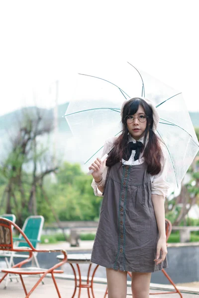 Menina asiática com guarda-chuva — Fotografia de Stock