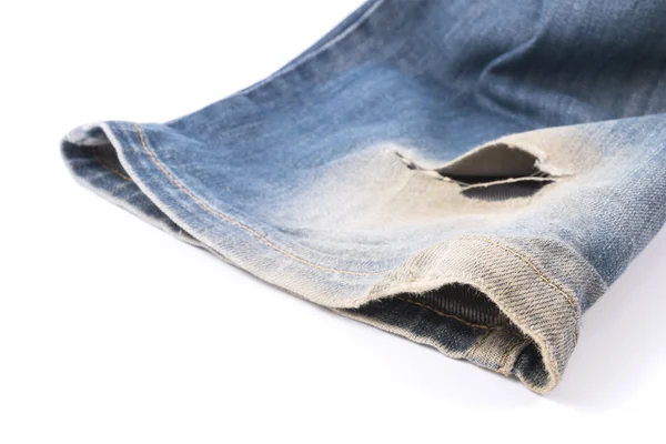 Calça jeans jeans azul com buraco — Fotografia de Stock