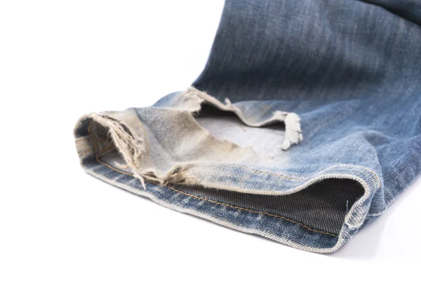 Calça jeans jeans azul com buraco — Fotografia de Stock
