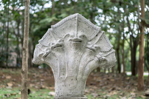 An old sculpture in the park — Stock Photo, Image