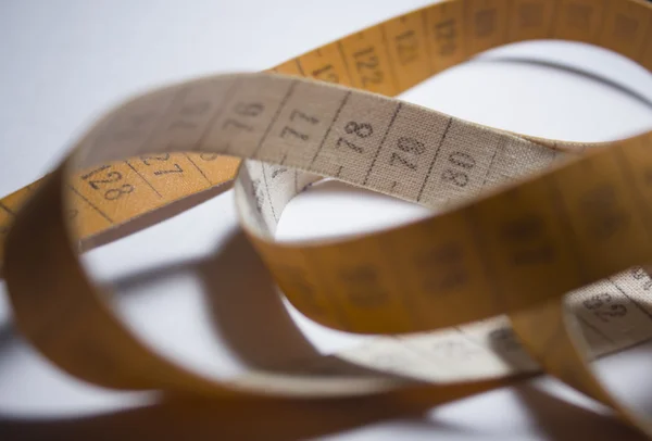 Measuring tape. Orange color — Stock Photo, Image