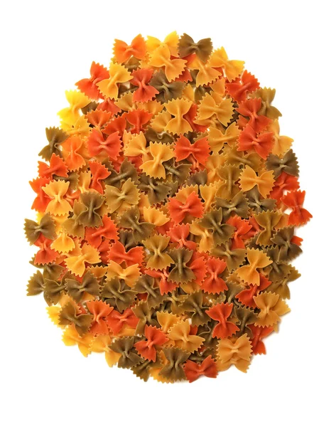 Pilha de macarrão Farfalle colorido — Fotografia de Stock