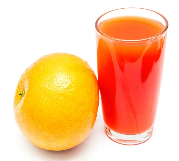 Glass of grapefruit juice and grapefruit — Stock Photo, Image