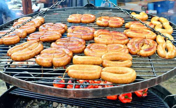 Sausages barbecue cooking — Stock Photo, Image