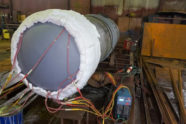 Heat treatment of welded seams. New tank, steel vessel for petrochemicals. Inspection of welded seams. Ultrasound.