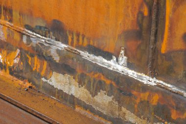 Defective Butt weld of welding of metal sheets. Repair of a tank for storing oil, gasoline and gas.         