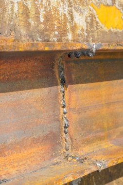 Manual arc welding. Defective butt weld of welding of metal sheets. Repair of a tank for storing oil, gasoline and gas.