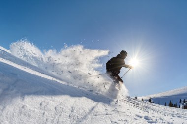 skier in deep powder clipart