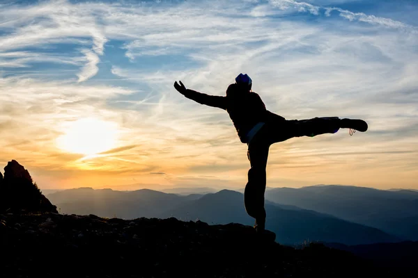 Girl dancing on top of the mountain — Stock Photo, Image
