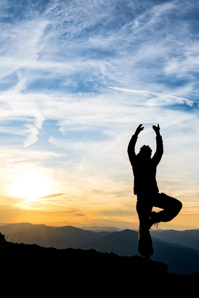 Girl dancing on top of the mountain — Stock Photo, Image