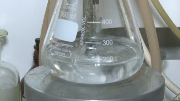 Experiment in chemical laboratory — Stock Video